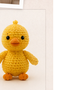 Yellow duck crochet toy